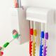 Дозатор автоматический зубной пасты Toothpaste Dispenser с держателем зубных щеток Toothbrush holder. Изображение №7
